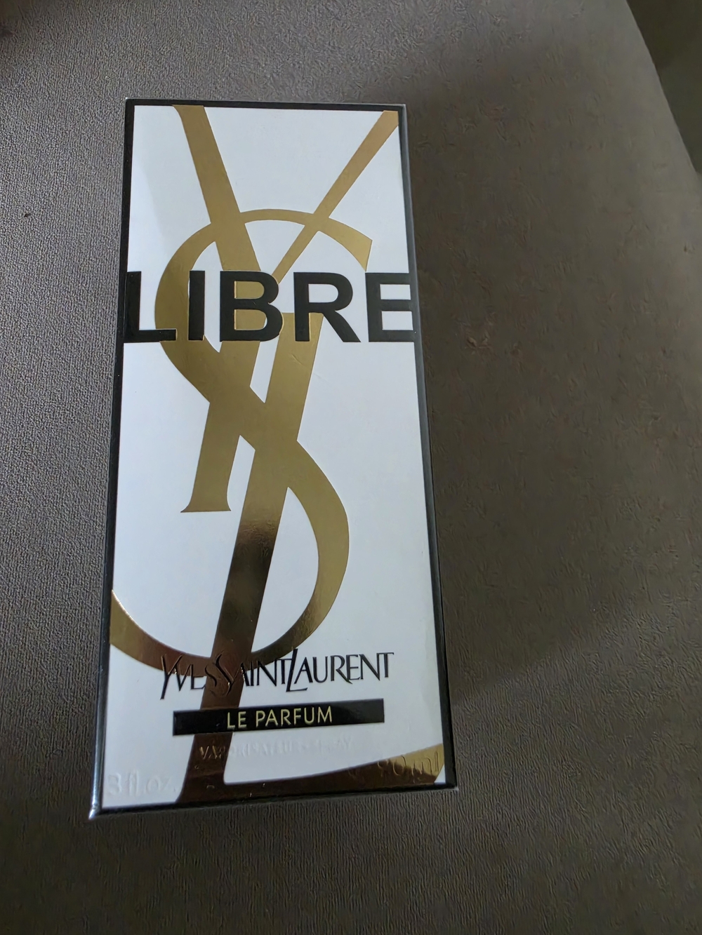 Yves Saint Laurent White and Gold Libre